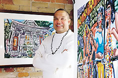 Stephen Murphy between two of his paintings at his Follow Me to New Orleans Exhibit